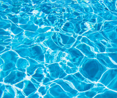 Clear blue water in swimming pool