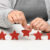 Customer experience feedback concept. Five red stars, the best r