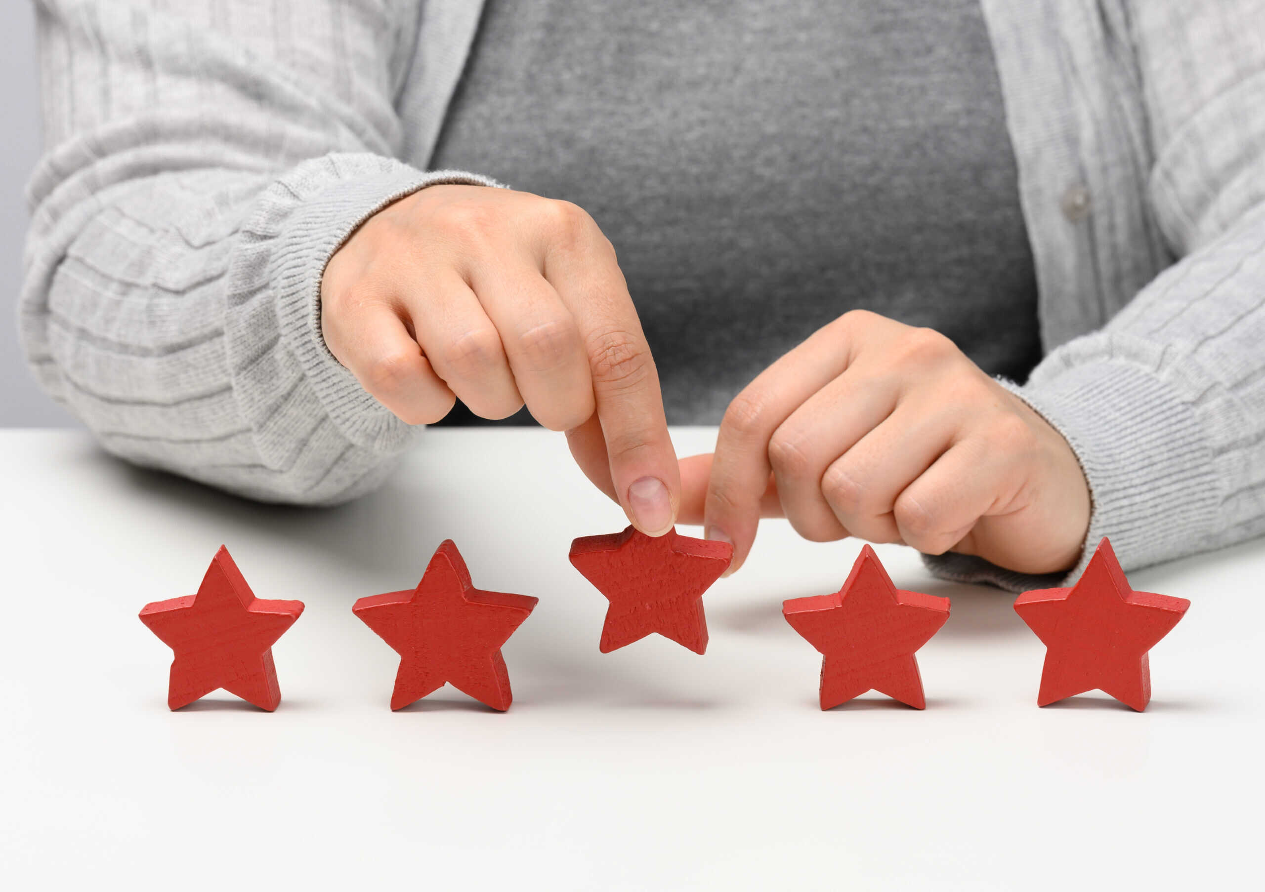 Customer experience feedback concept. Five red stars, the best r