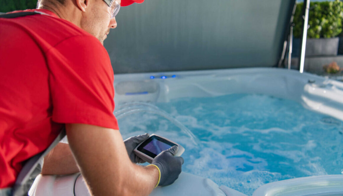 Garden SPA Technician Testing Hot Tub Remote