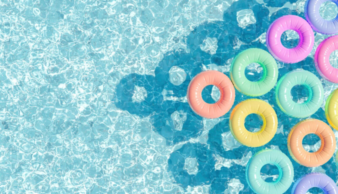 swimming pool seen from above with many rings floating