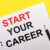 White notebook with inscription START YOUR CAREER written in black pencil on a bright yellow background.