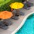 high-angle-view-lounge-chairs-by-swimming-pool_0x800