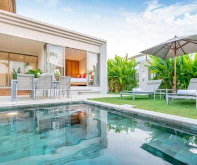 home-house-exterior-design-showing-tropical-pool-villa-with-greenery-garden-sun-bed-umbrella-pool-towels_0x800