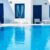 luxury-swimming-pool-with-blue-water-hotel-santorini-island-greece_0x800
