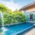 swimming-pool-by-house-against-sky_0x800