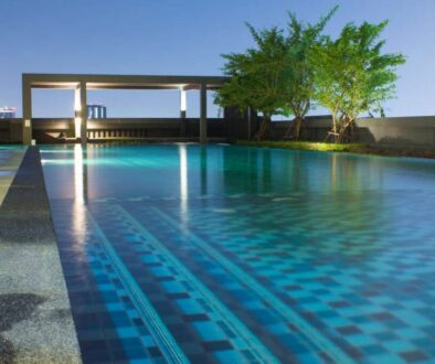swimming-pool-by-trees-against-blue-sky_0x800