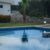 swimming pool near a house in a residential complex at sunset 3