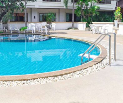 swimming pool with grab bars ladder