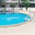 swimming pool with grab bars ladder