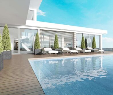 terrace-by-pool-with-sun-loungers-near-modern-house-3d-rendering_0x800