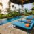 Swimming pool and lounge chairs in boutique hotel, Sri Lanka