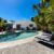 backyard-modern-house-with-swimming-pool-artificial-grass-stone-path-trees-chairs(6)_0x800