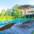 beautiful-umbrella-chair-around-swimming-pool-hotel-resort_0x800
