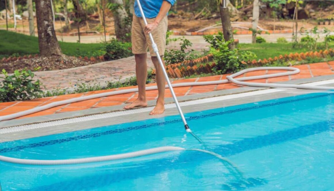 cleaner-swimming-pool-man-blue-shirt-with-cleaning-equipment-swimming-pools-sunny(1)_0x800
