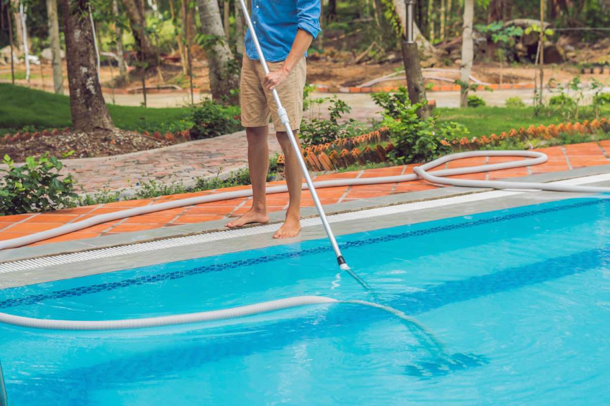 cleaner-swimming-pool-man-blue-shirt-with-cleaning-equipment-swimming-pools-sunny(1)_0x800