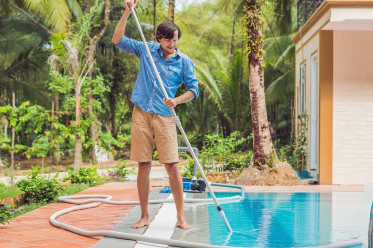 cleaner-swimming-pool-man-blue-shirt-with-cleaning-equipment-swimming-pools-sunny_0x800