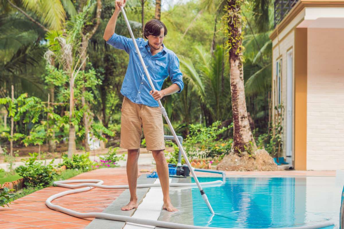 cleaner-swimming-pool-man-blue-shirt-with-cleaning-equipment-swimming-pools-sunny_0x800