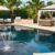elegant-resort-style-backyard-with-infinity-pool-tranquil-relaxation-areas(1)_0x800