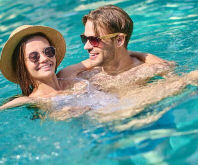 good-moments-young-happy-couple-spending-time-swimming-pool(1)_0x800