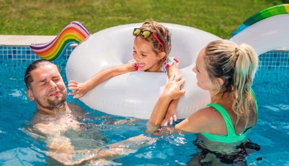 happy-parents-their-daughter-rubber-ring-are-swimming-pool_0x800