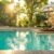 stunning-sunset-luxury-villa-pool-with-wooden-lounge-chairs-concept-opulence-serenity_0x800 (1)