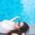 woman-sunglasses-lying-down-poolside_0x800