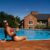 young-beautiful-woman-sunbathing-sitting-edge-pool_0x800
