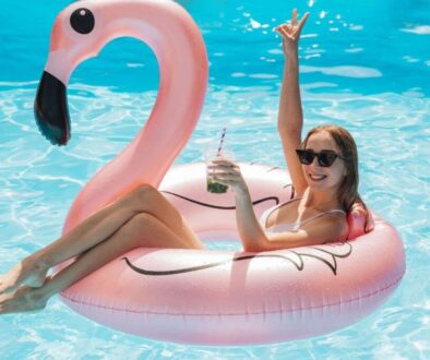 young-woman-relaxing-flamingo-swim-ring_0x800