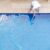 top-view-man-cleaning-swimming-pool(1)_0x800