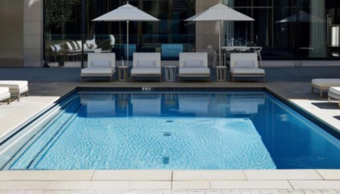 modern-minimalist-aesthetic-swimming-pool-by-capturing-photo-poolside-lounge-area_0x800