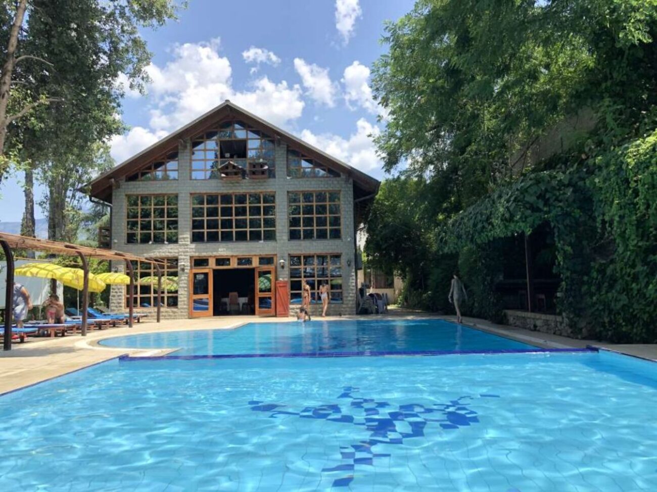 albanian-traditional-stone-house-with-swimming-pool_0x800