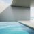 concrete-floor-room-sea-view-swimming-pool-with-empty-wall-background_0x800