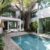 florida-usa-swimming-pool-trees-chairs-urban-landscape-with-blue-sky-reflecting-pool_0x800