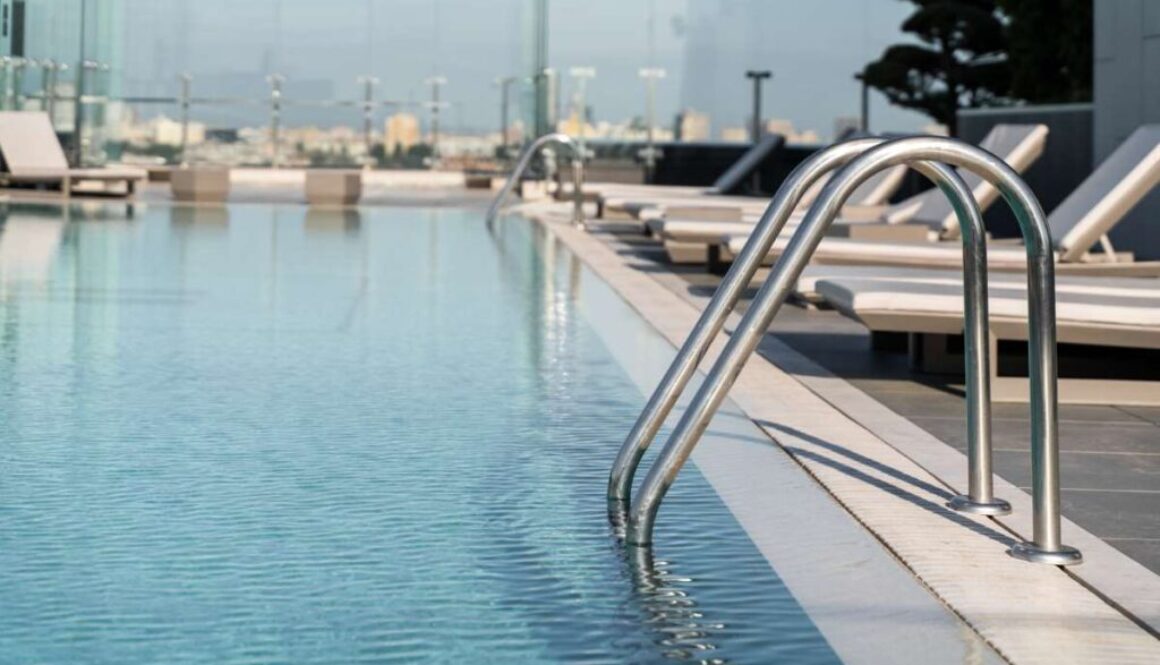large-spacious-pool-with-blue-water-have-good-rest-by-pool_0x800