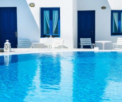 luxury-swimming-pool-with-blue-water-hotel-santorini-island-greece_0x800