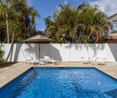 modern-building-with-swimming-pool-trees-chairs-landscape-with-blue-sky-scenic-enviroment(1)_0x800