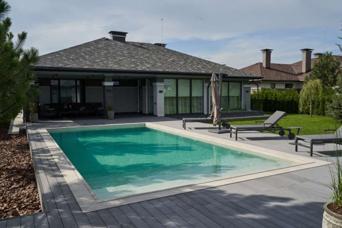 modern-villa-with-pool-deck-with-interior-home-swimming-pool-garden-terrace-summer-beach-lounge-sun-loungers-sunbathing-deck-private-swimming-pool_0x800