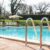 shiny-chrome-ladder-pool-with-blue-water_0x800