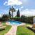 sun-beds-mattresses-near-luxury-pool-relaxing_0x800