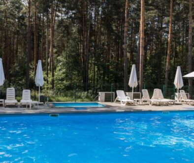 swimming-pool-forest-with-umbrellas-summer_0x800