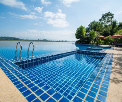 swimming-pool-near-khong-river-with-blue-sky-chiangsan-chiangrai-thailand_0x800