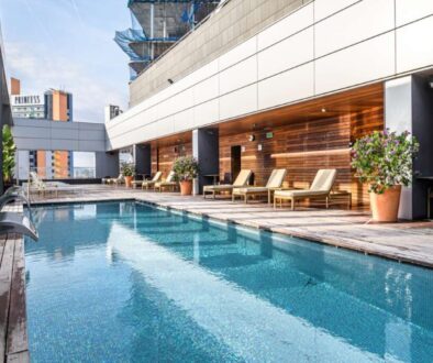 swimming-pool-roof-top-with-beautiful-city-view-skyscrapers-premium-hotel-03-01-2020-barcelona-spain(1)_0x800