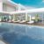 terrace-by-pool-with-sun-loungers-near-modern-house-3d-rendering_0x800