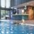 two-women-friends-enjoying-together-pool-group-females-smiling-swimming-pool_0x800